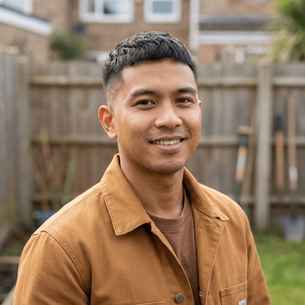 Male restaurant owner in his 30s, Black, professional and practical appearance suitable for hospitality industry